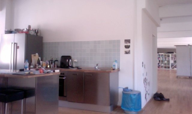 Amply. Loft with hardwood flooring