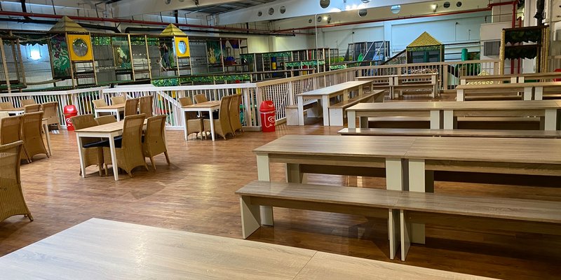 Indoor playground with e-cart track