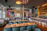 Kymata Modern - Elegant dining room with atmospheric lighting for company celebrations and special occasions.