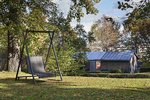 Tagungshotel mit Ambiente im Allgäu - Hauseigener Park mit Grillhütte und Lagerfeuerstelle 