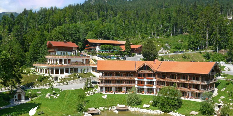 Mountain hotel with rustic barns, offices, cottages
