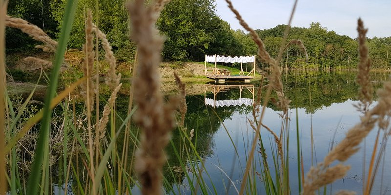 Lake with hut, jetty and water terrace