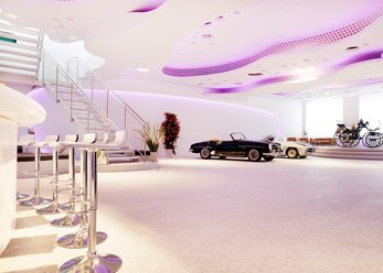 Oldtimer-Showroom mit organischen Formen