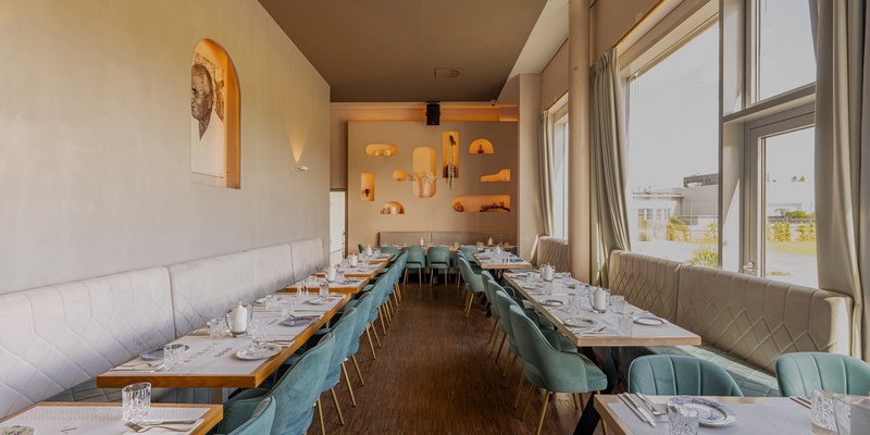 Kymata Modern - A separate dining area with a long table for groups, business dinners and private celebrations.