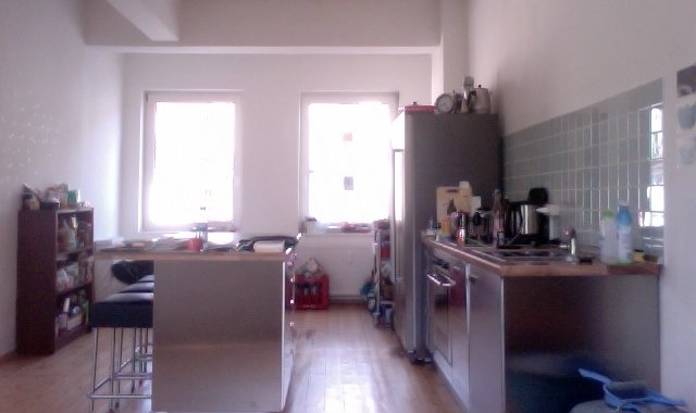 Amply. Loft with hardwood flooring