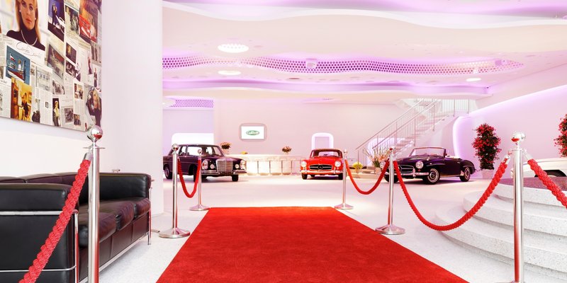 Classic car showroom with organic shapes