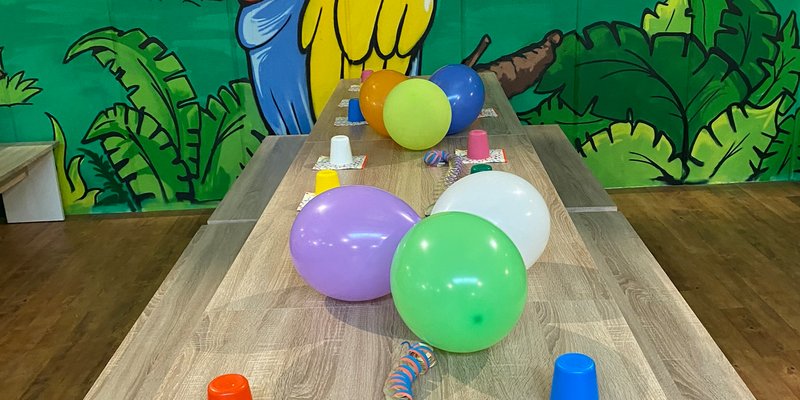 Indoor playground with e-cart track