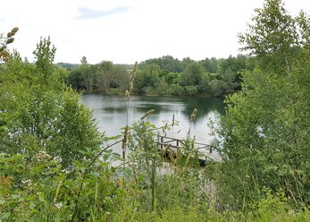 Lake with hut, jetty and water terrace