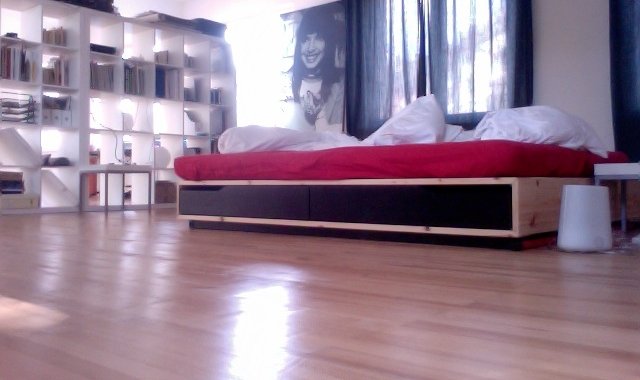 Amply. Loft with hardwood flooring