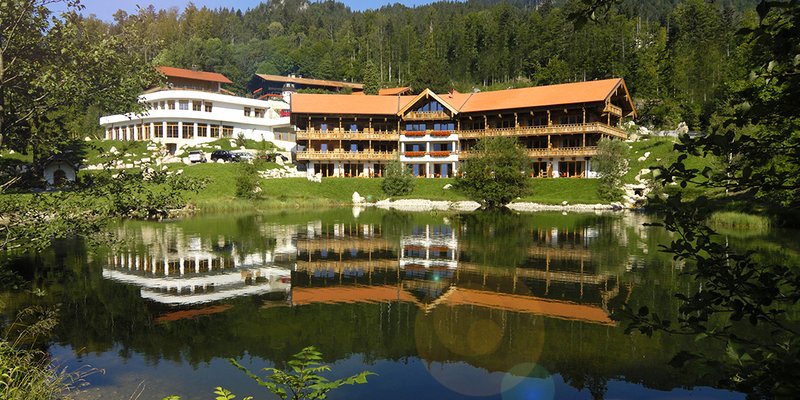 Mountain hotel with rustic barns, offices, cottages