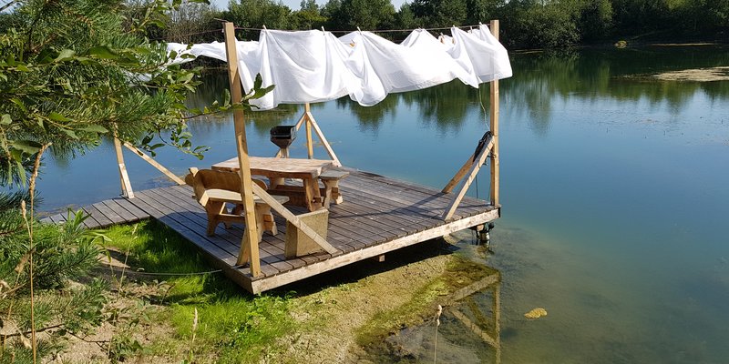 Lake with hut, jetty and water terrace